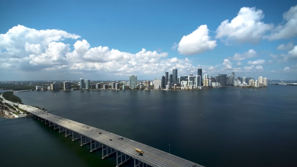 Aerial view of Miami skyline and bridge, capturing the impact of Florida’s population boom on urban growth