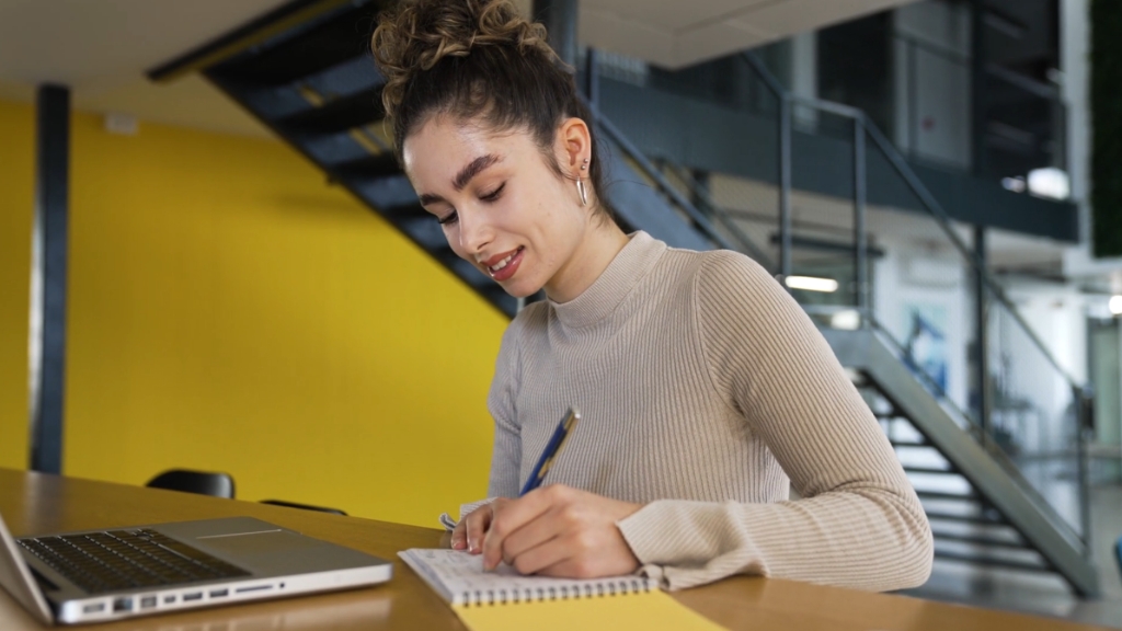 Woman planning brand promotion activities before a local event