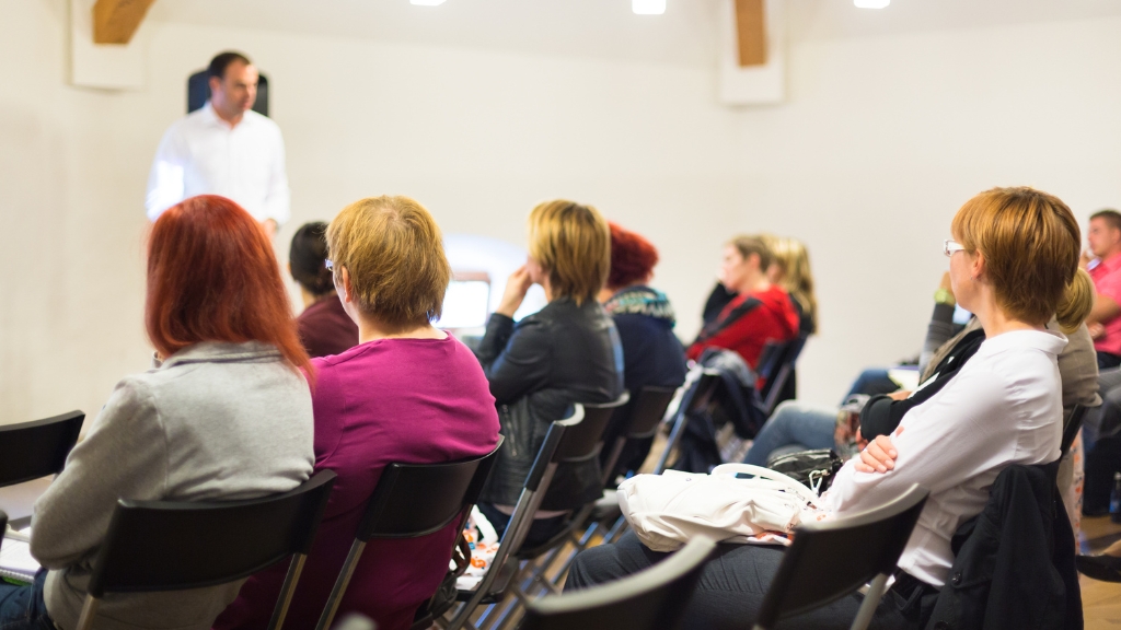 People attending an educational workshop to improve brand visibility