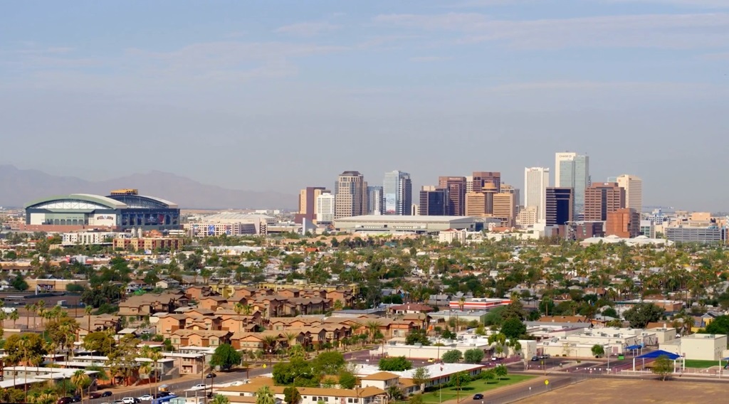 Panoramic view of downtown Phoenix with its skyline, residential neighborhoods, and Chase Field stadium