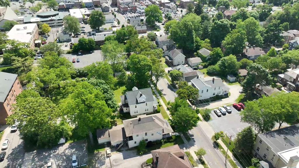 Aerial view of Westerville, Ohio, showing tree-lined residential neighborhoods with a mix of houses and small buildings near the town center