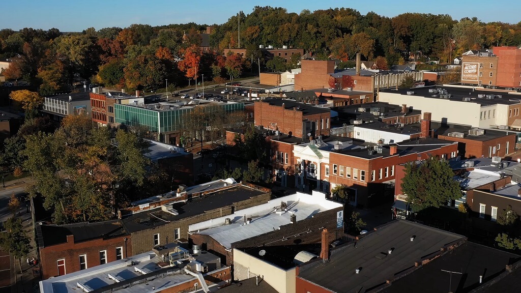 Aerial view of a residential Ohio neighborhood with low-rise buildings, tree-lined streets, and mixed housing density