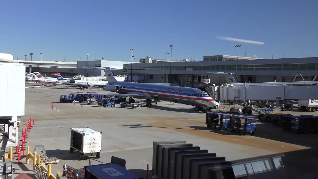 American Airlines aircraft connected to a jet bridge at Dallas Fort Worth International Airport