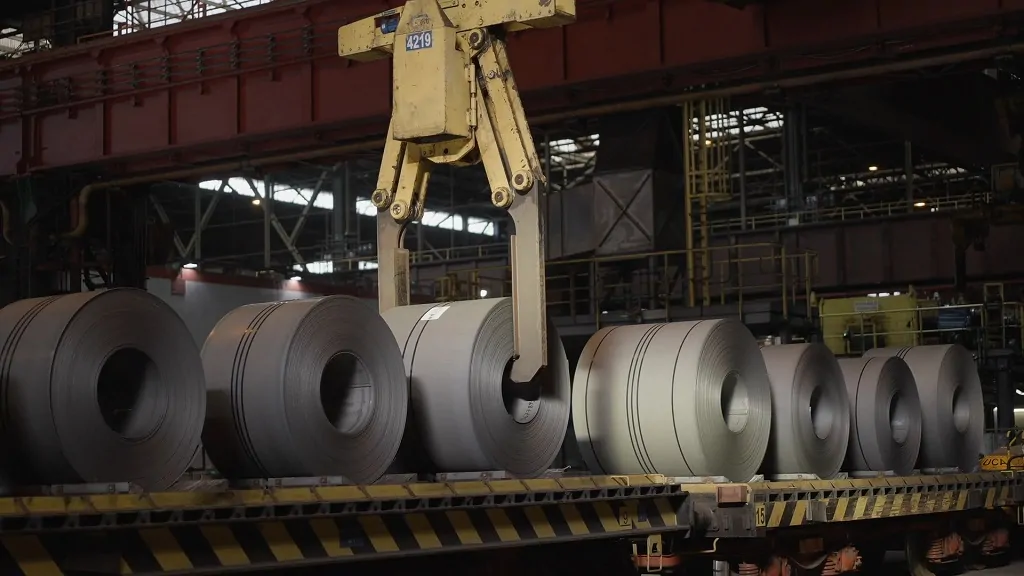 Heavy steel coils inside a production plant, reflecting industries impacted by U.S. tariffs on Canadian metals.