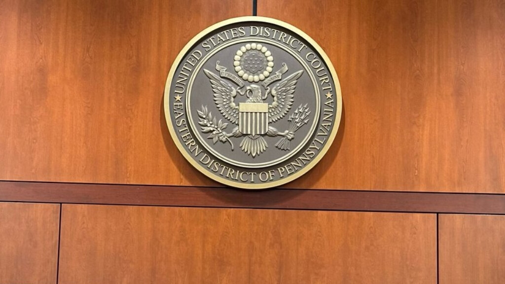 Seal of the United States District Court for the Eastern District of Pennsylvania displayed inside a federal courtroom