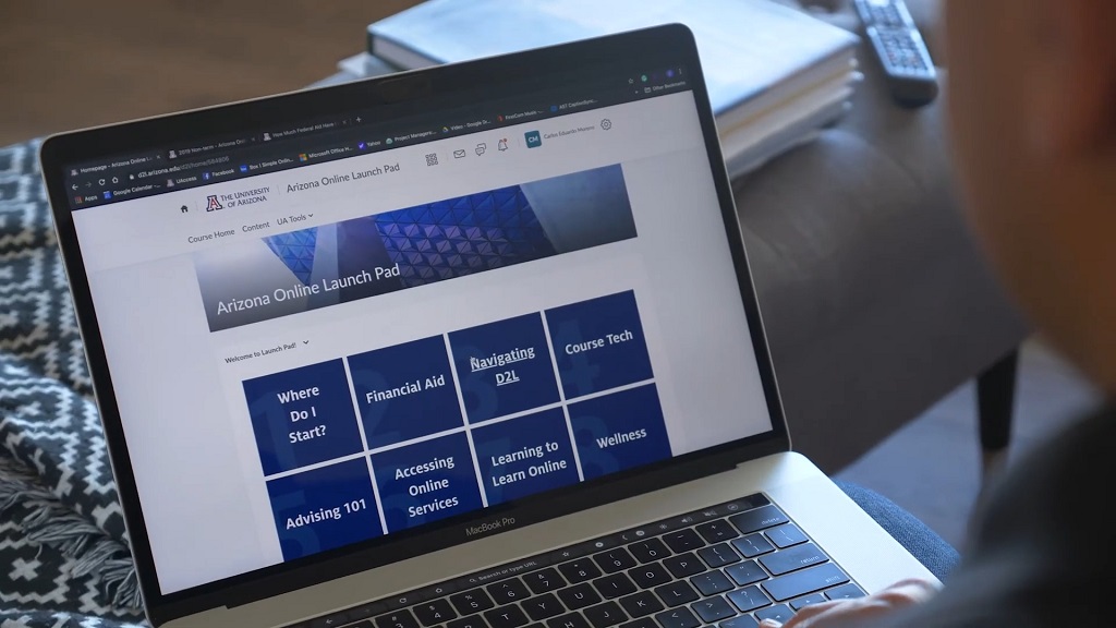 Laptop displaying University of Arizona Online student dashboard